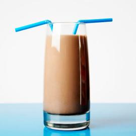 Glass of Chocolate Milk with Two Straws